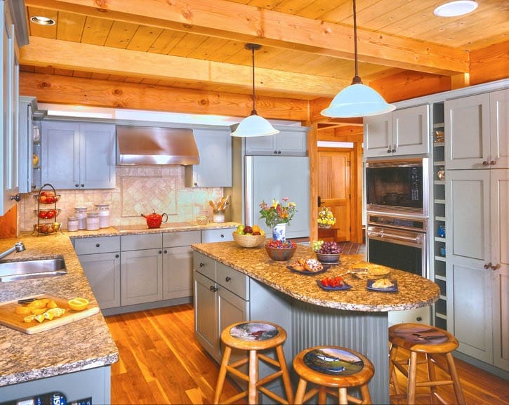post and beam kitchen with colorful cabinets