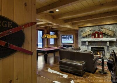 Lincoln Ski Home pool room with large fireplace