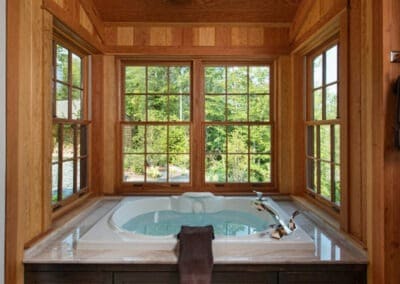 North Country, NH (T00490) bathtub surrounded by windows on three sides