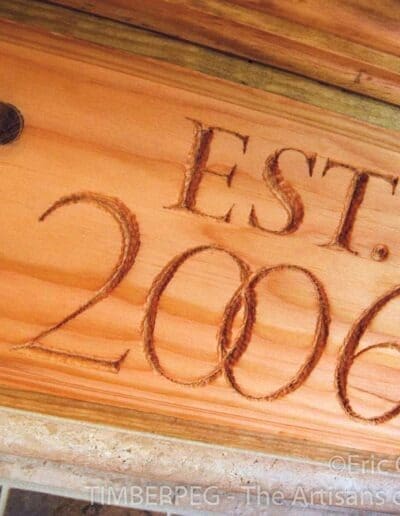 Normandy Glenn, NC (5787) est 2006 wooden sign with wooden pegs