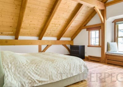 High Ridge, NH (5624) bedroom with window seat and timber frame