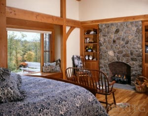 Bradford bedroom with fireplace and window seat