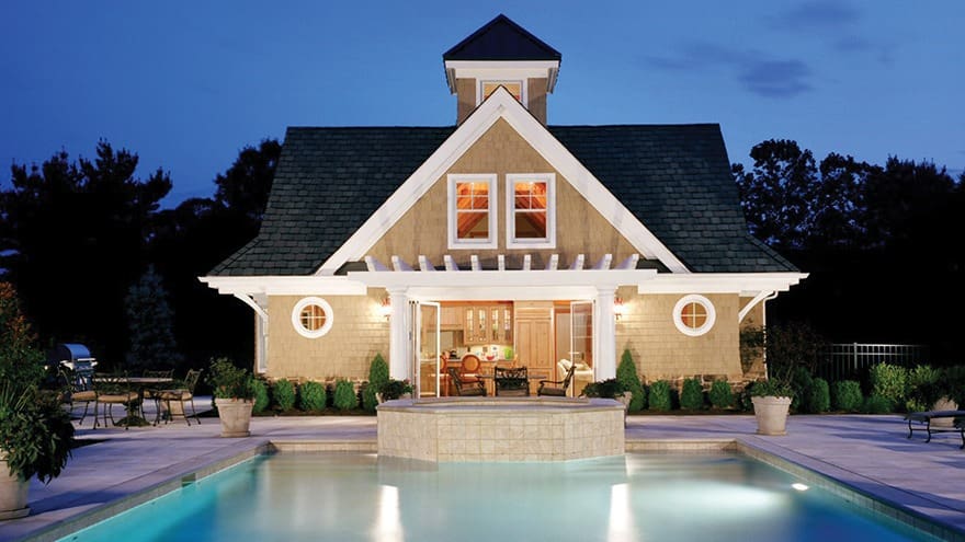 Farmingdale Guest Pool House (5676) exterior view from pool towards open doors of building