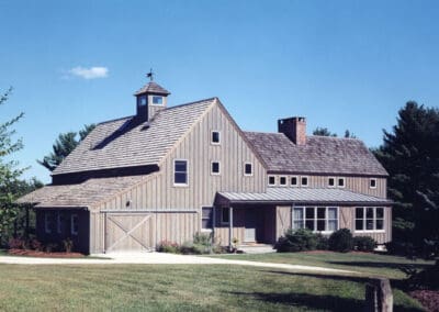 4500 Connecticut Barn Home exterior featuring board and batten siding and barn style doors