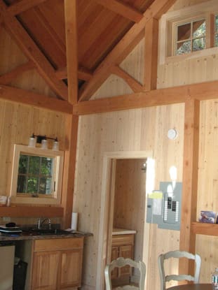 Water's Edge Cottage T00494 interior view of kitchenette and small bathroom